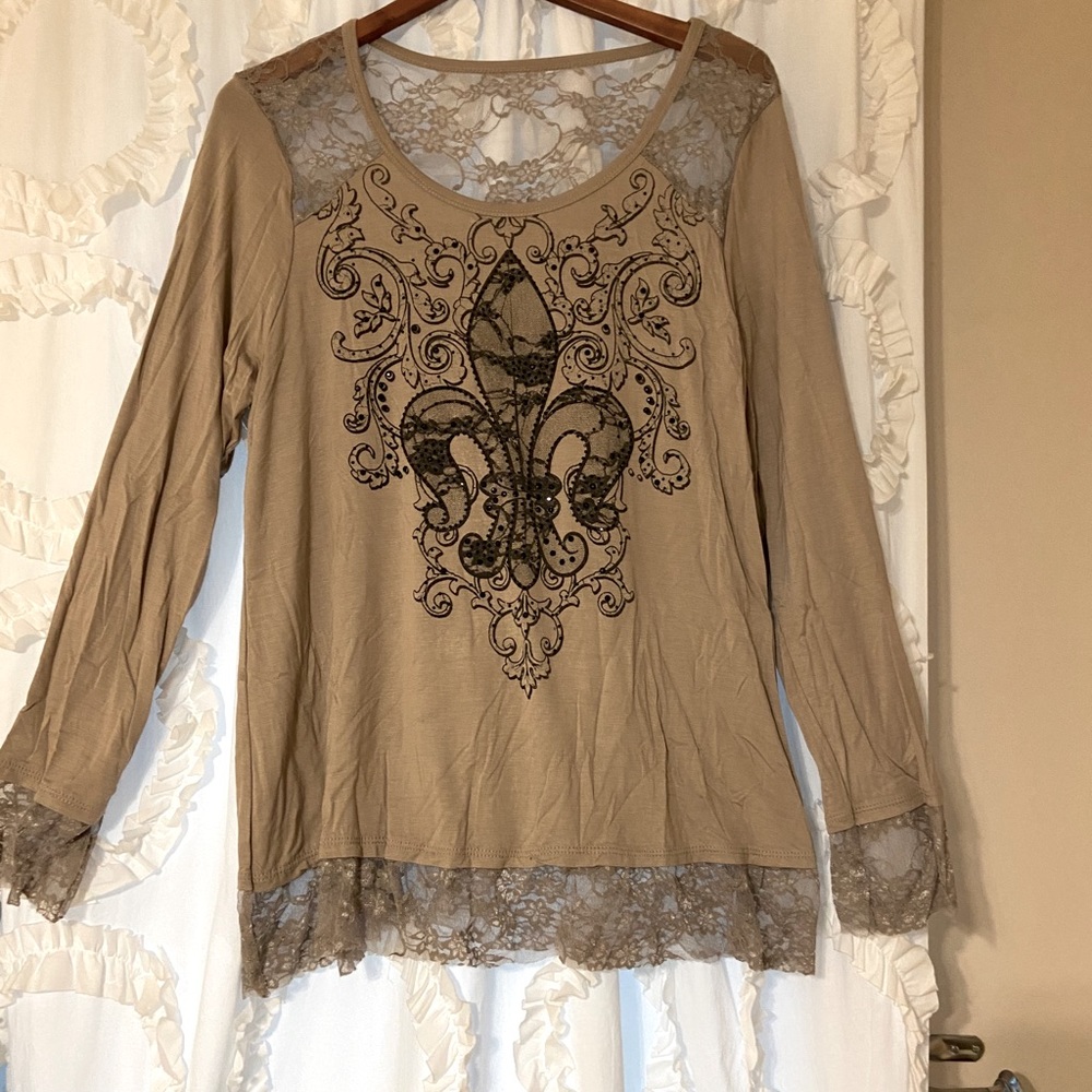 Very unique top. Lace accents